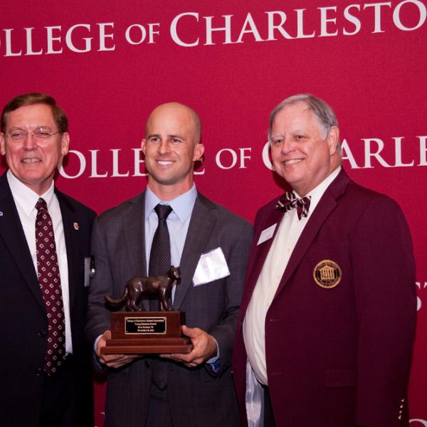 Brett Gardner (center) received the Young Alumnus of the Year award from College of Charleston president Glenn McConnell and Alumni Association president Daniel Ravenel.